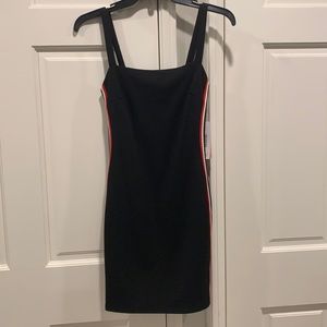 Black dress with red and white stripe detail